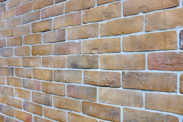Ceglany mur teksturę tła, wybrane koncentrują się na powierzchni cegły połowie ściany — Zdjęcie stockowe