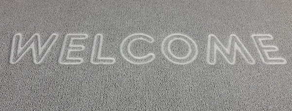 Welcome text on doormat — Stock Photo, Image