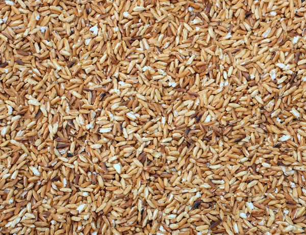 roasted rice background (rice for knead with spicy minced meat salad)