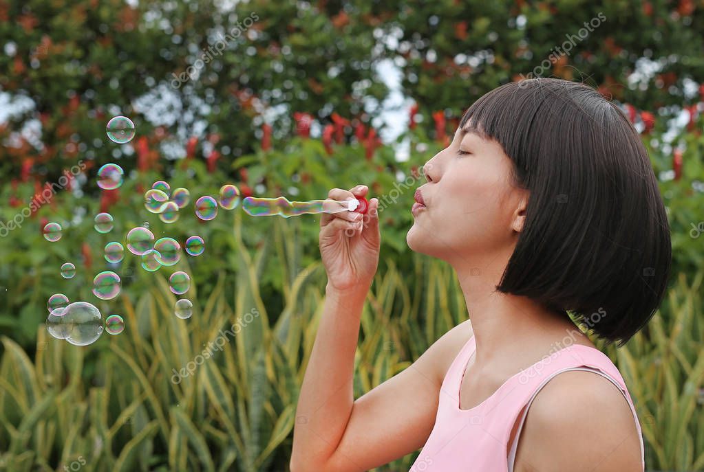 Outdoor bubble asian young