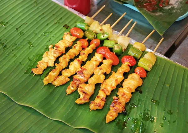 Barbeque grilled on the banana leaf — Stock Photo, Image