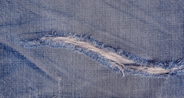 Jeans denim textuur gescheurd. — Stockfoto