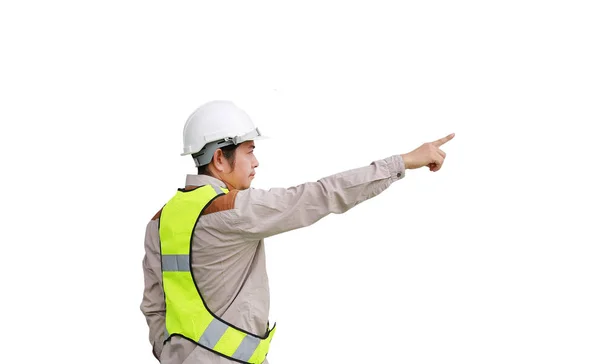 Строитель-мужчина, указывающий на белый фон — стоковое фото