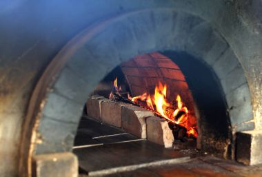 A wood fired brick oven. clipart