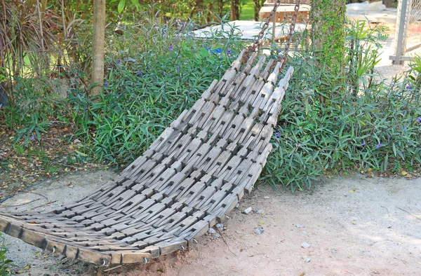 Wooden cradle in garden — Stock Photo, Image