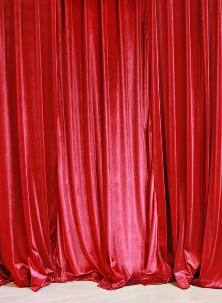 Red closed curtain background in a theater
