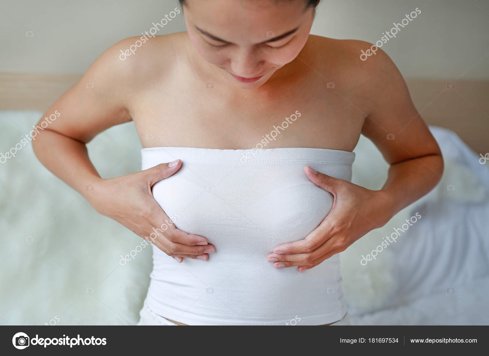 Nursing Mother Examines Her Nude Breasts Strong Women's Breasts Health  Stock Photo by ©civic_dm@hotmail.com 181697534