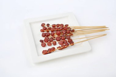 yıldız bektaşi üzümü şeker beyaz seramik plaka üzerinde