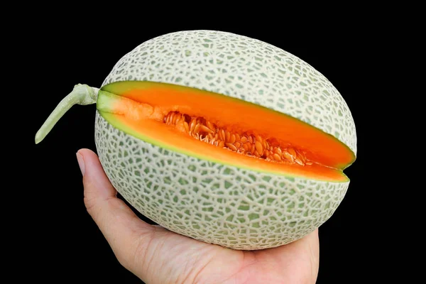 Melone Melone Parzialmente Tagliato Mano Sfondo Nero — Foto Stock