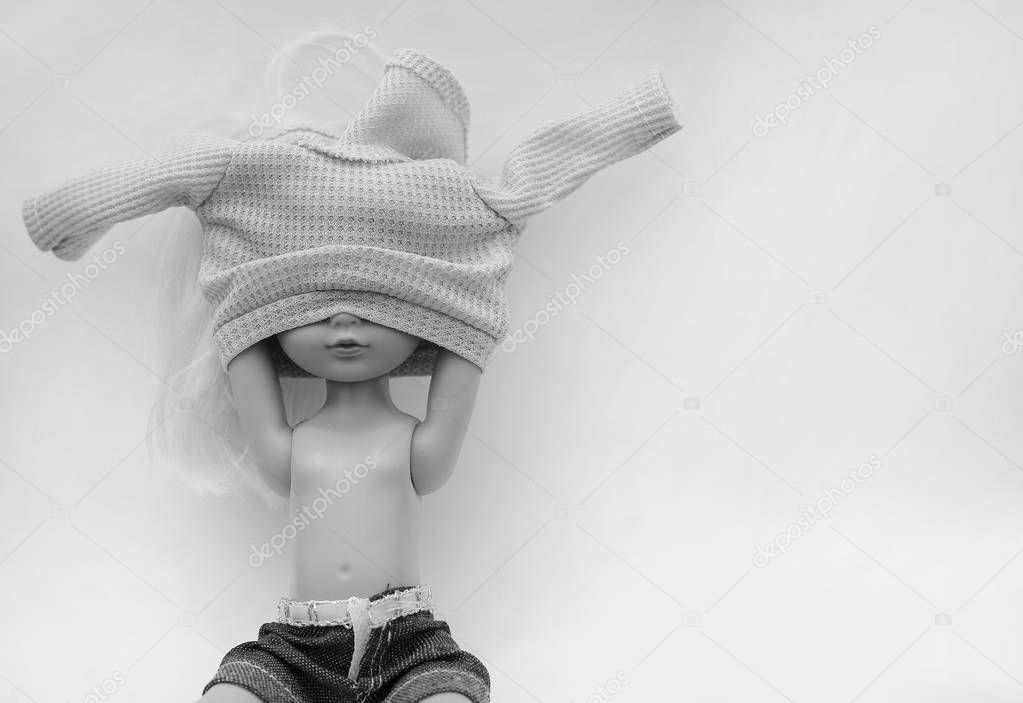 Naked Baby doll on white background, Black and white tone.