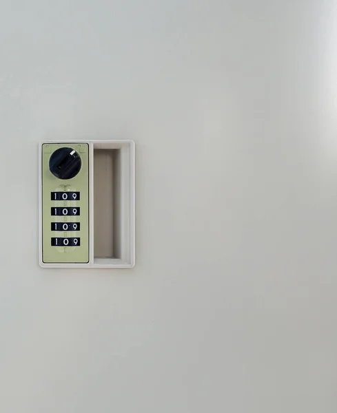 Combination code lock on cabinet door