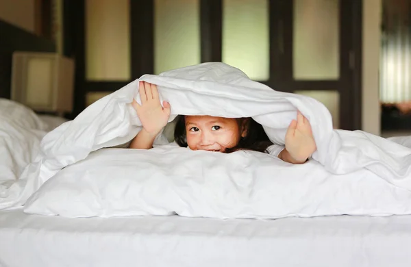 Cute Little Asian Girl Playing White Blanket Bed Home — Stock Photo, Image