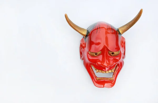 Traditional Japanese mask of a demon, Kabuki Mask on white background.
