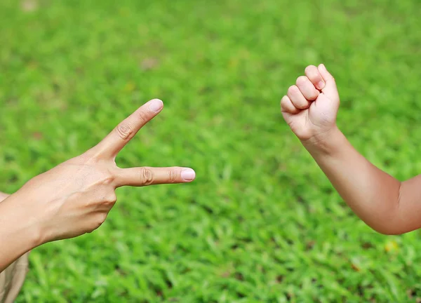 Hands Mother Daughter Scissors Rock Hands Green Grass Background — Stock Photo, Image