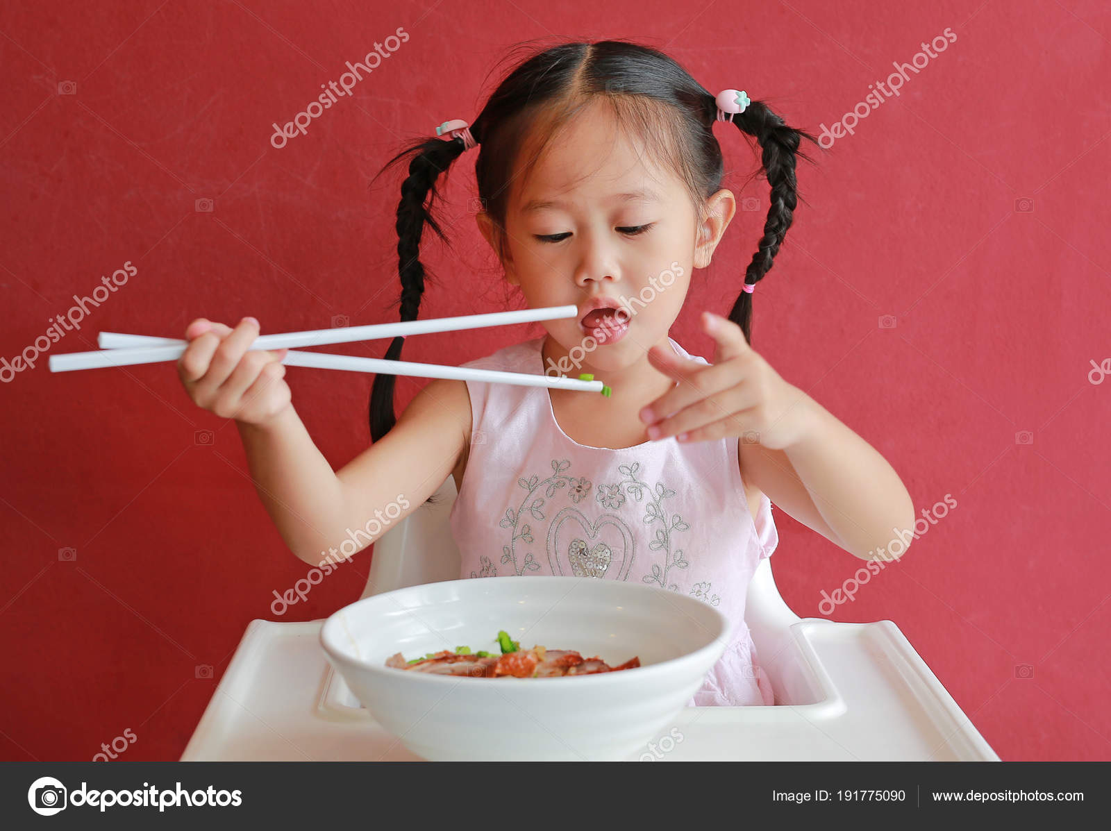 Little Asian Girl Eating Egg Noodle High Chair Red Wall Stock Photo C Civic Dm Hotmail Com 191775090