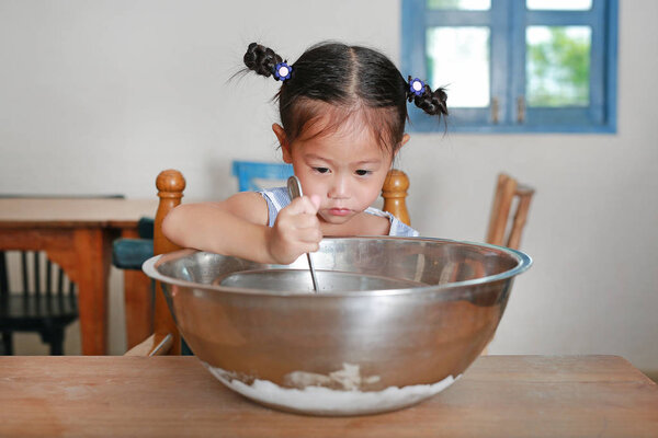 Little girl making Homemade Ice-Cream.