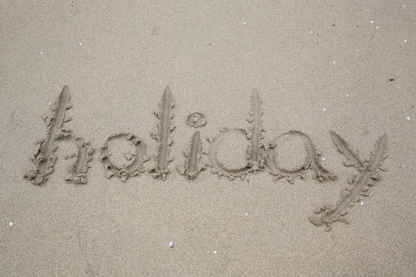 Holiday Written Sand Beach — стоковое фото
