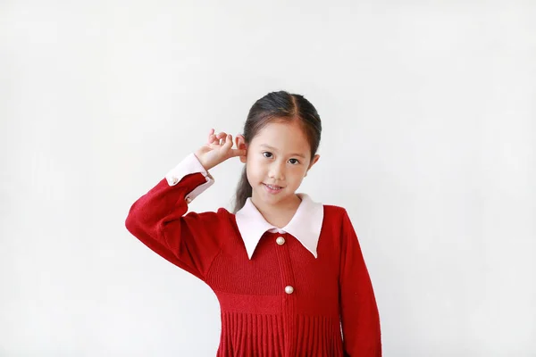 Niña Sonriente Juguetona Con Dedo Una Oreja Para Escuchar Aislado — Foto de Stock