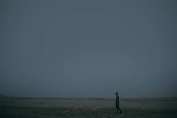 Silhouette Young Man Walking Sand Mist — Stock Photo, Image