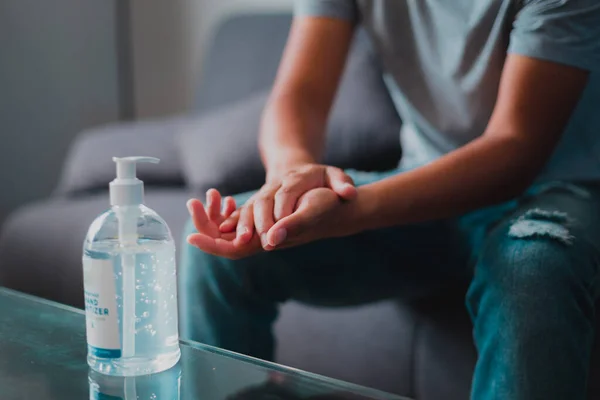 Young Person Washing Hands Using Sanitizer Royalty Free Stock Photos