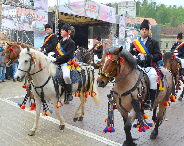 Riders during Brasov Juni parade — Stock Photo, Image
