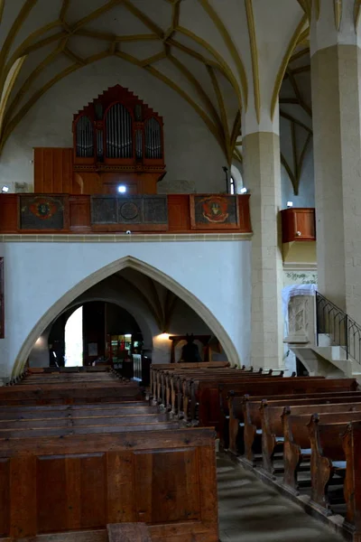 Inside old medieval saxon lutheran church in Sighisoara, Transylvania, Romania — Stock Photo, Image