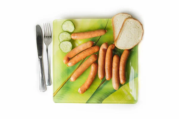 Yeşil Plaka Ekmek Çatal Bıçak Takımı Beyaz Bir Arka Plan — Stok fotoğraf