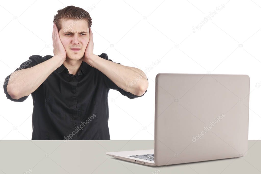stressed out man with computer on white background