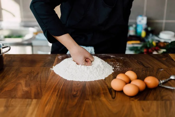 Chef making fresh pasta in the kitchen