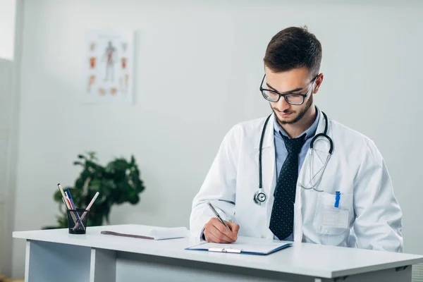 Young Doctor Sitting His Office Desk — Stock Photo, Image