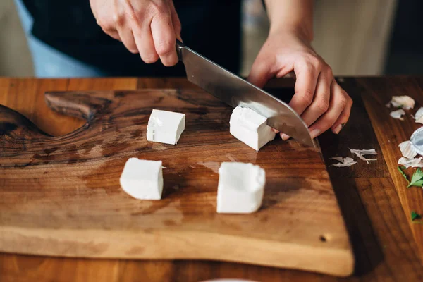 Female Chef Cutting White Cheese Wooden Board — Stock Photo, Image