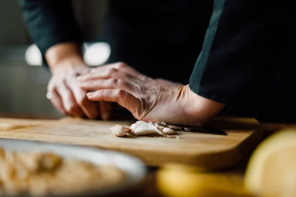 Chef Crushing Garlic Knife Wooden Board — Stock Photo, Image