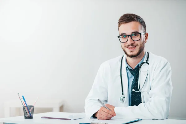 Young Doctor on the Job. Volunteer at the hospital gains practical knowledge in treating disease