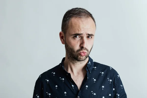 Young amusing male in studio — Stock Photo, Image