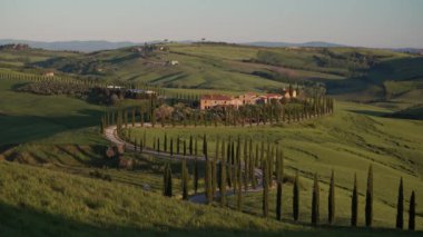 Winding or drunk road in Tuscany. Surroundings of the city Monticello. Long Shot