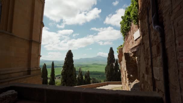 Picturesque view from stone fortress on amazing Tuscan landscapes and cypresses — ストック動画