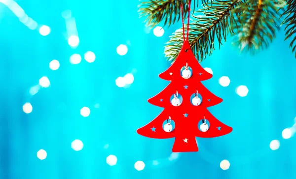 Vánoční přání s jedlí a výzdoba na třpytky, osvětlení pozadí — Stock fotografie