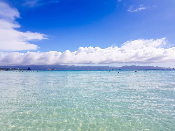 ocean, white beach blue sky sand sun daylight relaxation landscape viewpoint for design postcard and calendar
