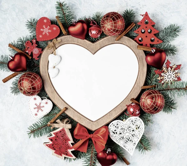 Christmas card, heart-shaped frame, with Christmas decorations, golden and red color. — 스톡 사진