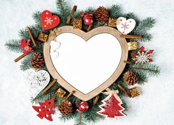 Christmas card, heart-shaped frame, with Christmas decorations, golden and red color. — 스톡 사진