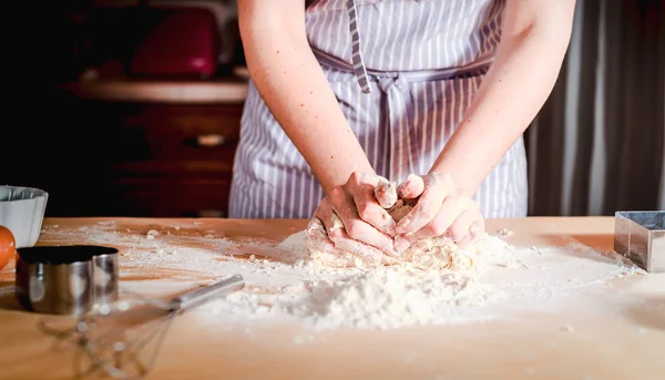 Fingers on dough, chef kneads dough for baking, concept cooking, bakery — Stockfoto