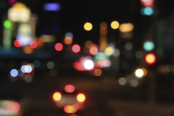 Blurry lights of cars in the street