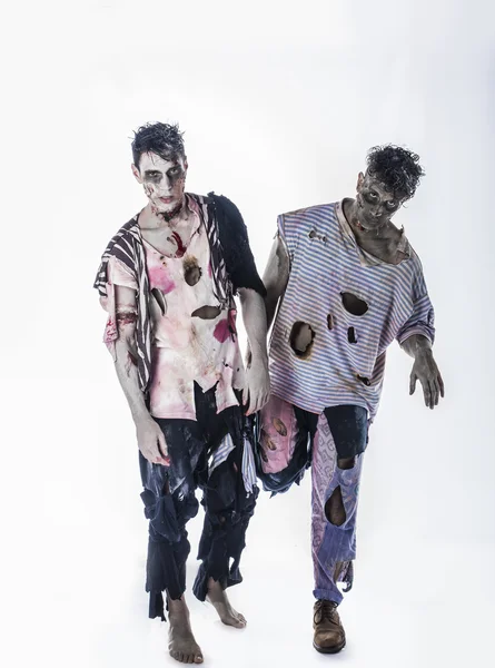 Dos zombies hombres pie sobre fondo negro —  Fotos de Stock