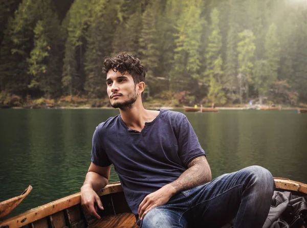 Young man relaxing in boat — Stock Photo, Image