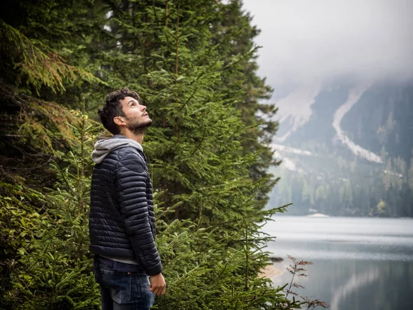 Young man relaxing in the mountain — Stock Photo, Image