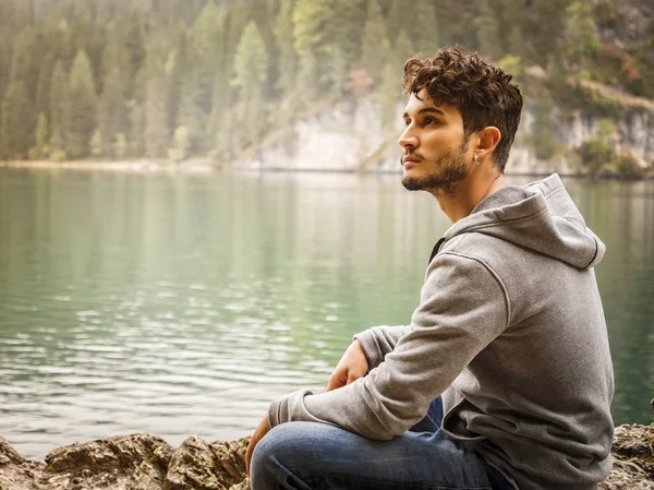 Young man relaxing in the mountain — Stock Photo, Image