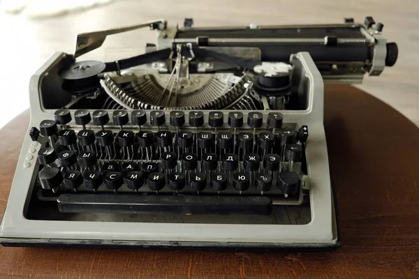 Old black typewriter with round keys — Stock Photo, Image