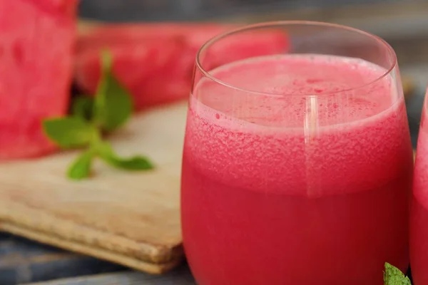 Delicious juicy watermelon and juice on the table — Stock Photo, Image