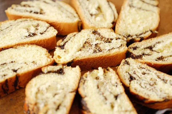 Fresh Baked Poppy Seed Roll Table — Stock Photo, Image