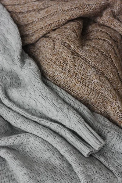 Beautiful knitted grey and brown sweaters macro